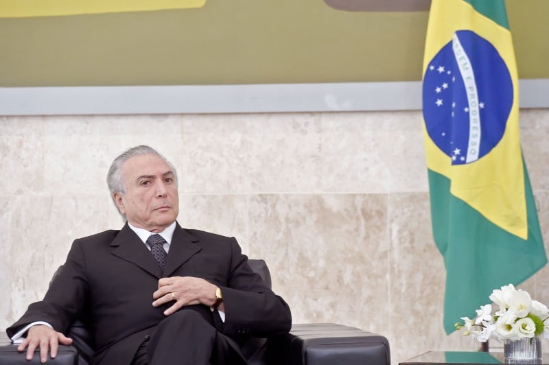  Brazilian acting President Michel Temer attends a ceremony of the presentation of credentials of Ambassadors at Planalto Palace in Brasilia on May 25, 2016. / AFP PHOTO / EVARISTO SA  