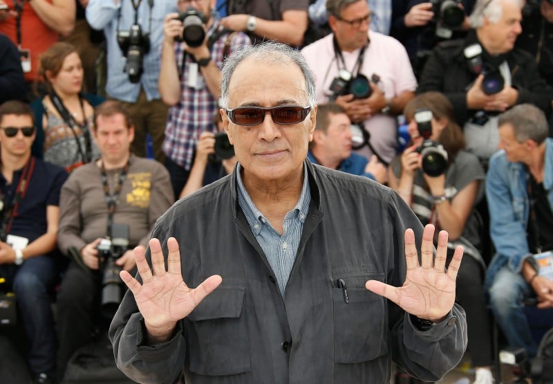 This file photo taken on May 22, 2014 shows Iranian director and President of the Cinefondation Jury Abbas Kiarostami posing during a photo-call of 