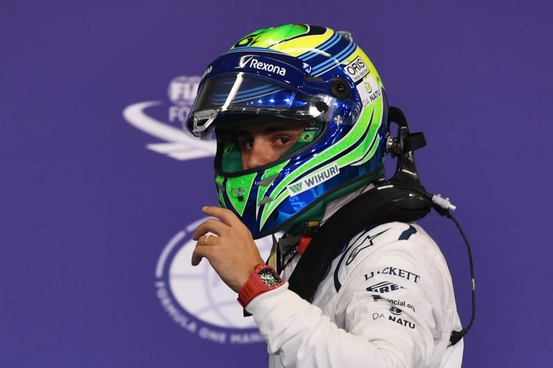 Williams Martini Racing's Brazilian driver Felipe Massa looks on as he leaves his car at the end of the qualifying session as part of the Abu Dhabi Formula One Grand Prix at the Yas Marina circuit on November 26, 2016.
Lewis Hamilton will start on pole for the Abu Dhabi Grand Prix title showdown after the defending champion bettered his Mercedes teammate Nico Rosberg in qualifying. Red Bull's Daniel Ricciardo came in third to start on the second row at Yas Marina where the Australian is joined by the Ferrari of Kimi Raikkonen. / AFP PHOTO / Andrej ISAKOVIC