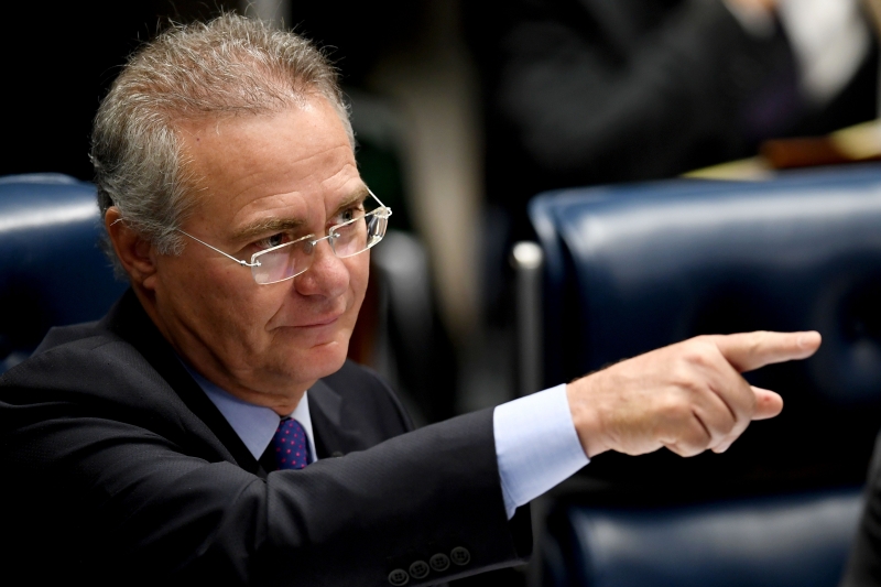 Brazilian Senate President Renan Calheiros speaks during a session of the Senate in Brasilia on December 8, 2016. 
Brazil's Supreme Court Wednesday overruled a bid to suspend the powerful Senate speaker from his position as he faces trial for alleged embezzlement, offering some relief to the scandal-hit government. / AFP PHOTO / EVARISTO SA
      Caption BONECOS