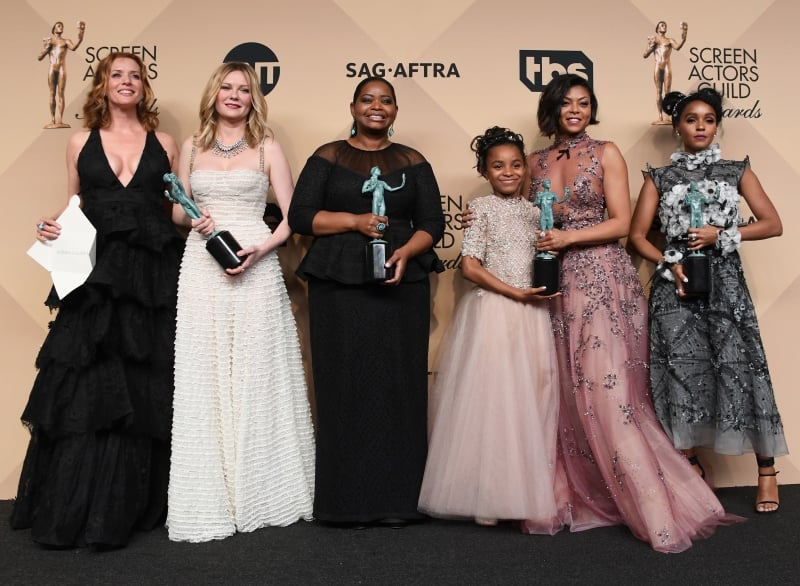 LOS ANGELES, CA - JANUARY 29: (L-R) Actors Kimberly Quinn, Kirsten Dunst, Octavia Spencer, Saniyya Sidney, Taraji P. Henson, and Janelle Monael, co-recipients of the Outstanding Performance by a Cast in a Motion Picture award for 'Hidden Figures,' pose in the press room during the 23rd Annual Screen Actors Guild Awards at The Shrine Expo Hall on January 29, 2017 in Los Angeles, California.   Alberto E. Rodriguez/Getty Images/AFP
      Caption