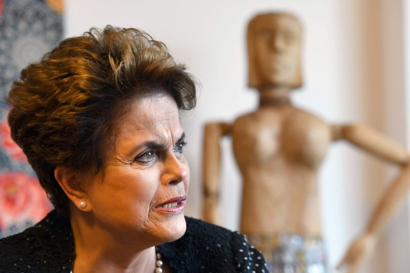 Former Brazilian President (2011-2016) Dilma Rousseff speaks with AFP during an interview in Brasilia on February 17, 2017. 
Rousseff spoke about the current Brazilian economic situation and the possibility of running for a seat in Congress in the next elections. / AFP PHOTO / EVARISTO SA
      Caption