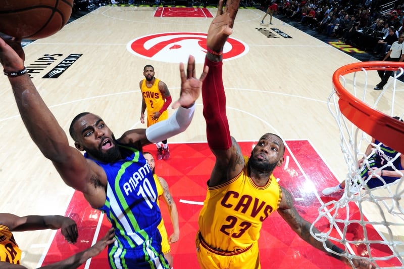 ATLANTA, GA - MARCH 3: Tim Hardaway Jr. #10 of the Atlanta Hawks shoots a lay up during the game against LeBron James #23 of the Cleveland Cavaliers on March 3, 2017 at Philips Arena in Atlanta, Georgia. NOTE TO USER: User expressly acknowledges and agrees that, by downloading and/or using this Photograph, user is consenting to the terms and conditions of the Getty Images License Agreement. Mandatory Copyright Notice: Copyright 2017 NBAE   Scott Cunningham/NBAE via Getty Images/AFP
      Caption