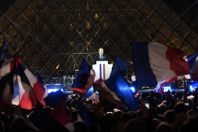 French president-elect Emmanuel Macron delivers a speech in front of the Pyramid at the Louvre Museum in Paris on May 7, 2017, after the second round of the French presidential election. Emmanuel Macron was elected French president on May 7, 2017 in a resounding victory over far-right Front National (FN - National Front) rival after a deeply divisive campaign.
Eric FEFERBERG/AFP