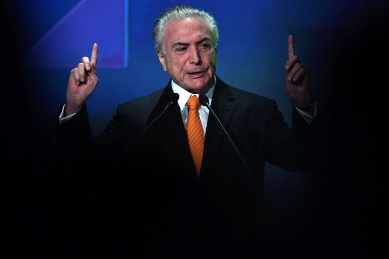 Brazilian President Michel Temer speaks during an Investment Forum in Sao Paulo, Brazil on May 30, 2017. / AFP PHOTO / NELSON ALMEIDA
      Caption