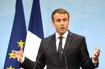 Macron pede reforma da UE e propõe criação de agência europeia de refúgio