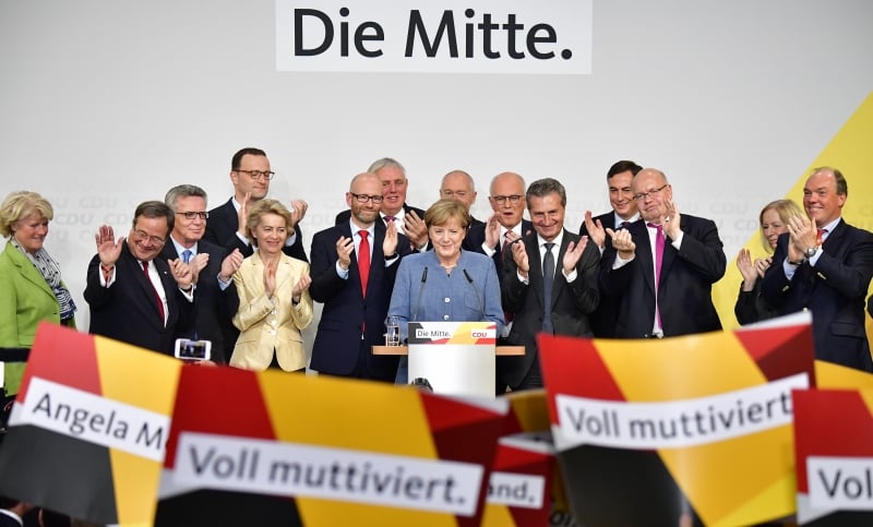 Merkel fez an�ncio no discurso de vit�ria, no quartel-general do Partido Crist�o-Democrata (CDU)