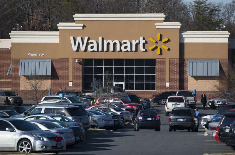 (FILES)  IN THIS DECEMBER 311, 2015 FILE PHOTO, A WALMART STORE IS SEEN IN LANDOVER, MARYLAND. US RETAIL BEHEMOTH WAL-MART STORES REPORTED ON AUGUST 18, 2015 A DIP IN SECOND-QUARTER PROFITS DUE IN PART TO THE STRONG DOLLAR AND HIGHER OPERATING COSTS. AFP PHOTO / SAUL LOEB