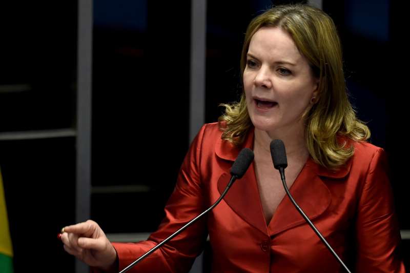 Senator Gleisi Hoffmann attends a debate of a vote on suspending Brasilian President Dilma Rousseff and launching an impeachment trial, in Brasilia on May 11, 2016.
Brazil's Senate opened debate Wednesday ahead of a vote on suspending President Dilma Rousseff and launching an impeachment trial that could bring down the curtain on 13 years of leftist rule in Latin America's biggest country. Even allies of Rousseff, 68, said she had no chance of surviving the vote.  / AFP PHOTO / EVARISTO SA